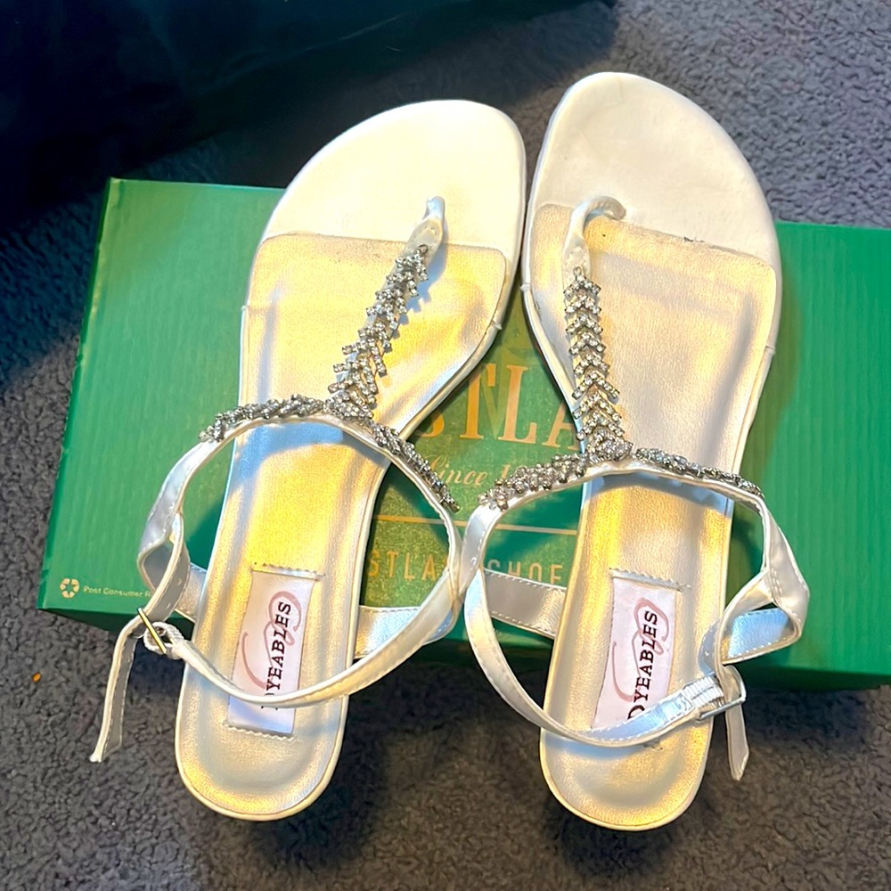 Size 9 wedding, prom or party sandals. Worn once. White satin.